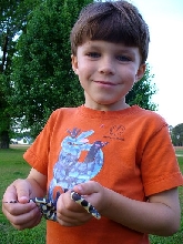 5yo Noah & Sparkle, his Cali King snake