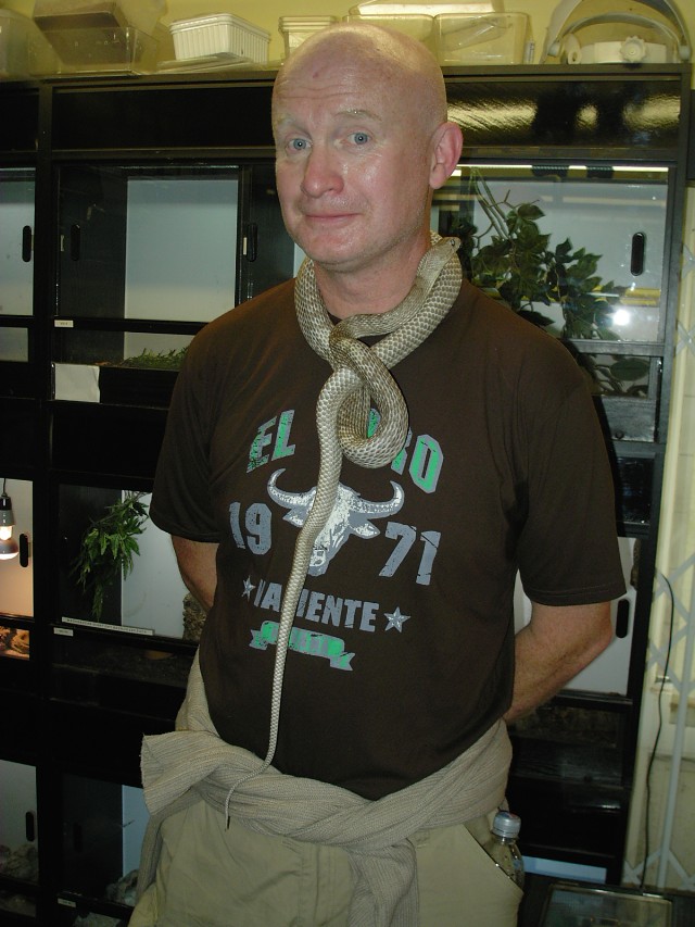 coachwhip around neck