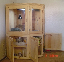 Corner cabinet reptile cage