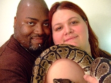 me and my fiancee', she loves our snakes now lol