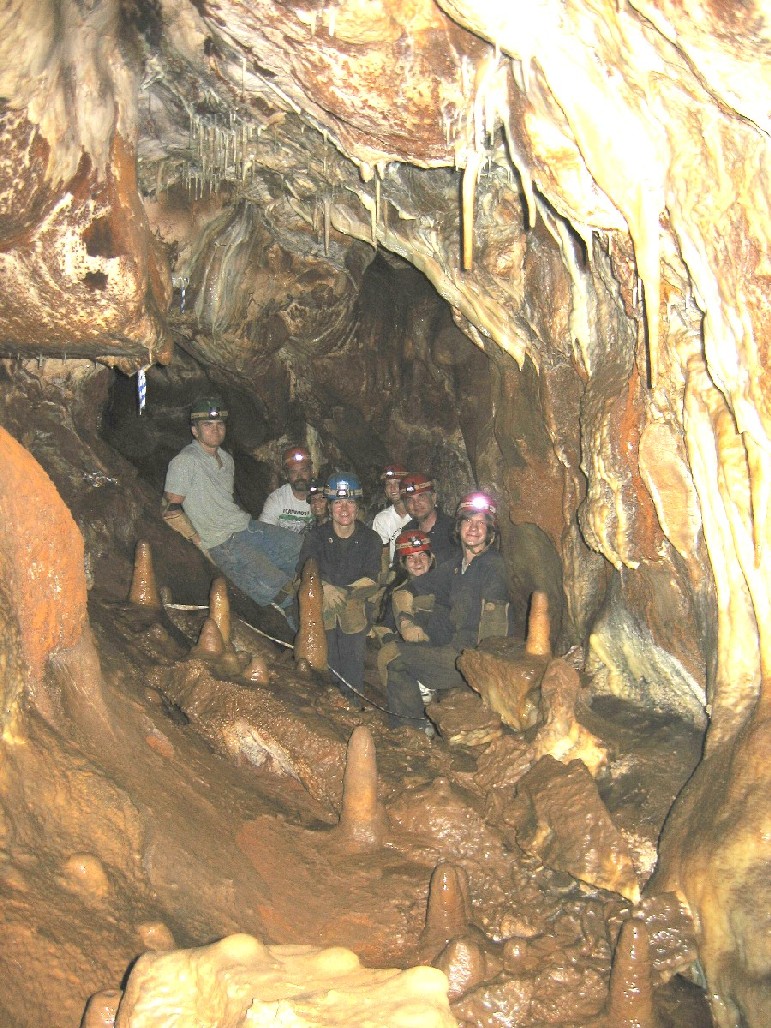 Family portrait in Cave among stalagtites
