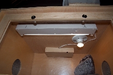 Cage light fixtures showing lumichrome bulb