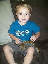 This baby loves his snaky!