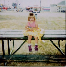 My oldest daughter and my albino burm.
