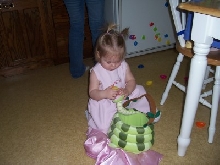 Granddaughter feeding the snake