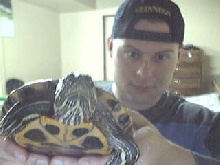 Me holding up my 19year old Red ear slider