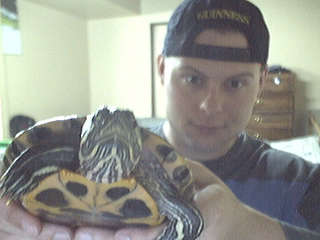 Me holding up my 19year old Red ear slider