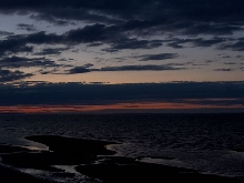 Sunset on stormy night