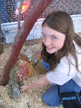 Me petting iguanas