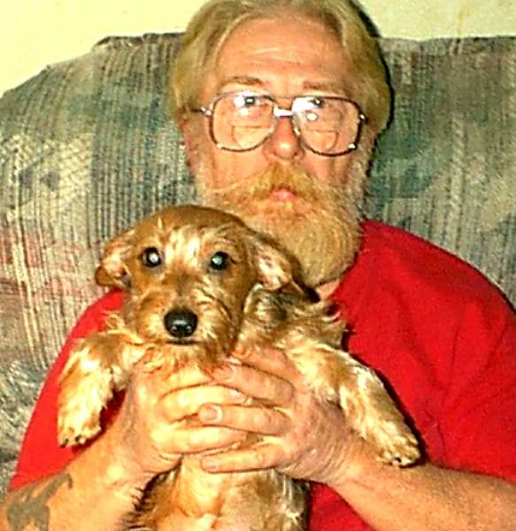 My Husband and Agatha, our Dachshund Mix