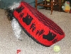 Bed...I know the tennis ball is under here.