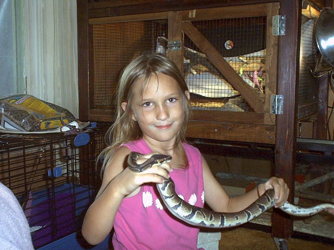 Jessica with her pet ball pythons