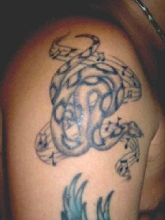 Another shot of boa tattoo