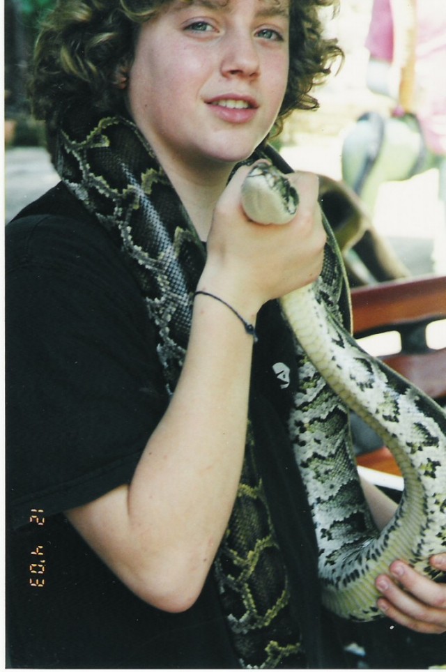 Me to years ago in thiland with not so calm Burumese python