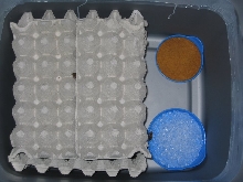 First container with egg crate on top