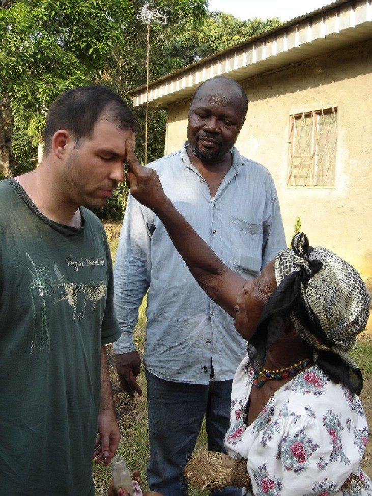 Paul Bodnar and Dr. Zachee Denis Bitjaa Kody receiving an African Tradition