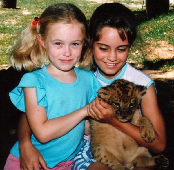 Jen & Lynda holding a lion!